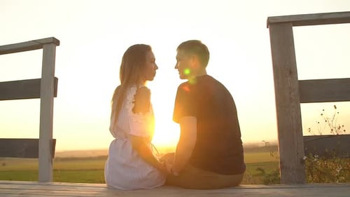 Loving Couple Kissing at Sunset