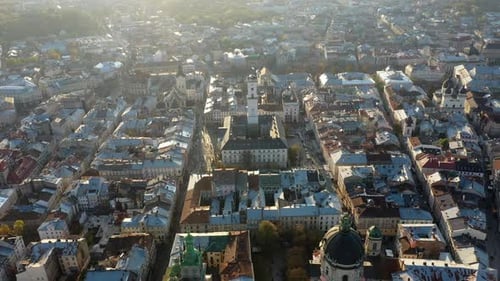 Aerial Drone Video of Lviv Old City Center - Roofs and Streets, City Hall Ratusha