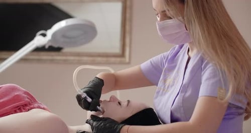 Cosmetology Procedure of the Machine Exfoliation Face Peeling 60p Prores HQ