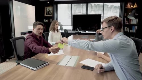 Five Colleagues Brainstorming in Modern Office Boardroom