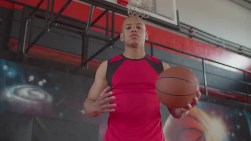 Black Basketball Player Tossing Ball Between Hands