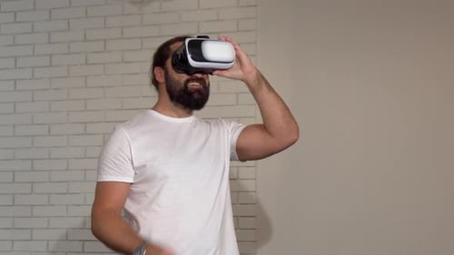 Man Using Virtual Reality Headset in Studio