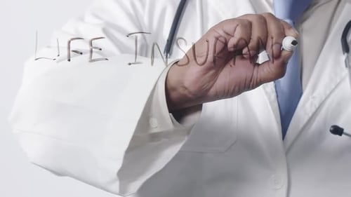 Doctor Writes 'Life Insurance' on Screen