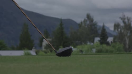 Hitting a golf ball. Close up. Slow motion