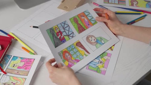 Artist Coloring Comic Book Storyboard with Pencils