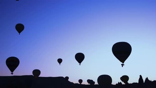 Hot Air Balloons Soaring at Twilight