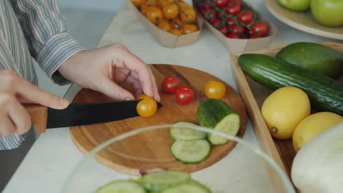 Slicing Fresh Tomatoes For a Salad