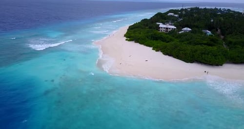 Daytime Aerial Abstract Shot of A Sandy White Paradise Beach and Blue Water