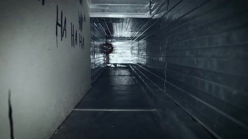 Evil Clown Crawling in Dark, Narrow Tunnel