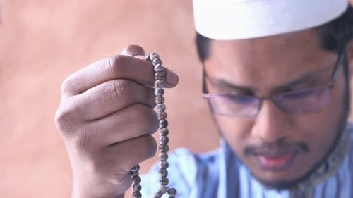 Close Up of Muslim Man Praying During Ramadan,
