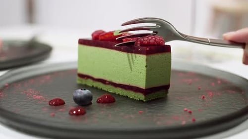 Fork Slices Into Delicious Berry Cake