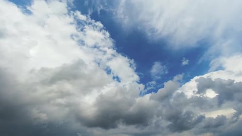 Clouds Drifting Across a Blue Sky