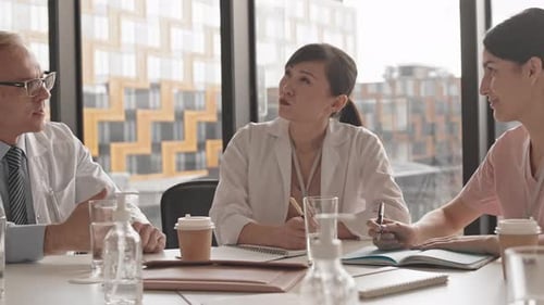 Medical Professionals Collaborate in a Modern Office Setting