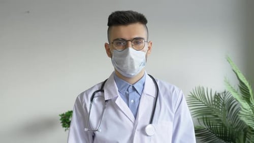 Doctor Wearing Face Mask and Stethoscope
