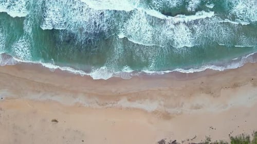 High and powerful waves coming fast to the beach, waves in winter day