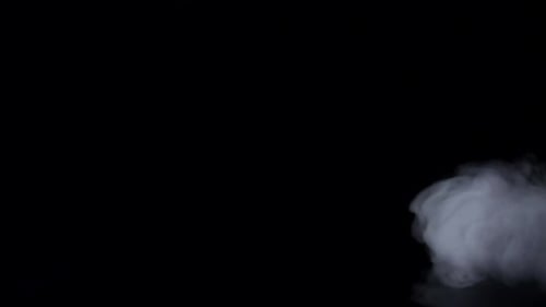 Cloud of White Smoke on Black Studio Background, Slow Motion