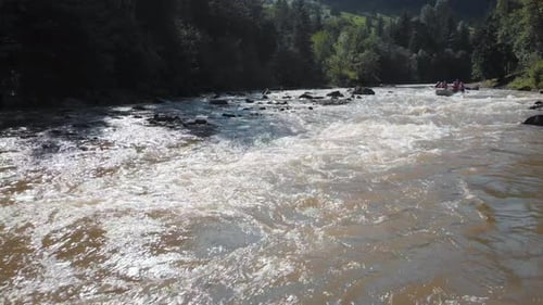 Adventurous River Rafting Trip in Mountainous Landscape