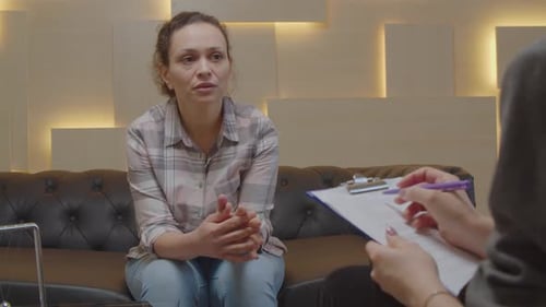 Woman Talking With Therapist During Session