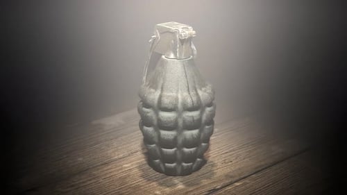 Endless 360 degrees animation of pineapple grenade in the dark background. 4KHD