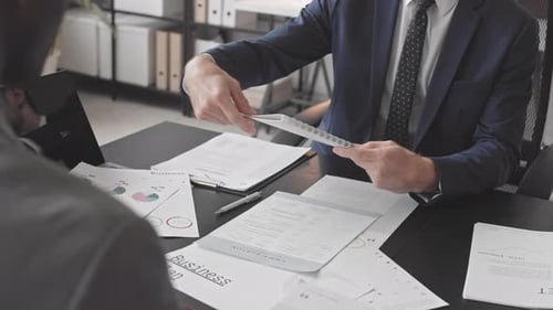 Coworkers Working with Documents