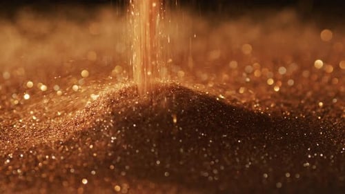 Goldene Glitzer-Edelsteine laufen auf schwarzem Hintergrund