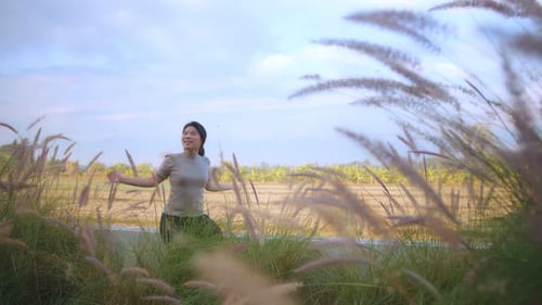 asian female woman hand rise stretch morning freshness and cheerful at bedroom terrace
