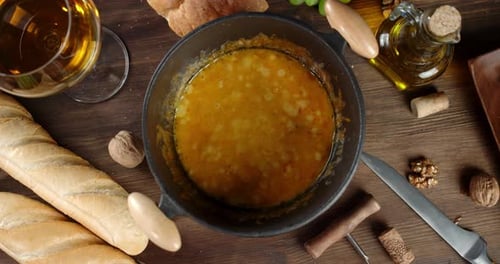 Fondue in the Pot Rotates Slowly.