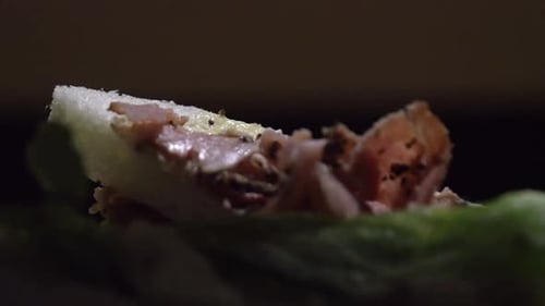 Making Sandwich with Lettuce and Cheese