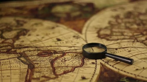 Antique World Map with Magnifying Glass Close Up