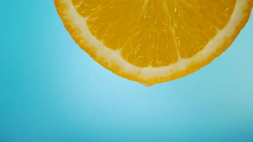 Juice Flows Down on Orange Fruit