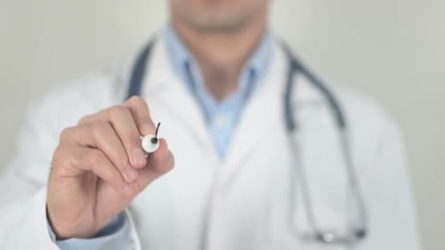Medical Professional Writes "Infection" on Clear Surface