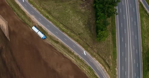 Aerial View of Blue Truck Parked Off Highway
