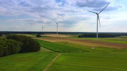 Line of Wind Energy Turbines in Summer