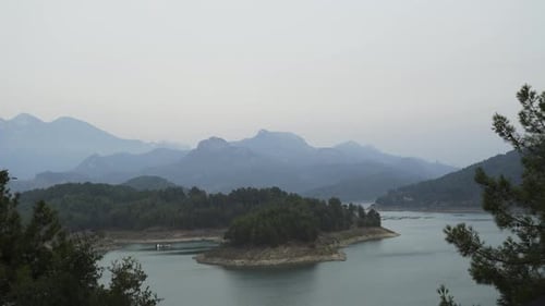 Island and Mountains in the Lake Time Lapse 4K