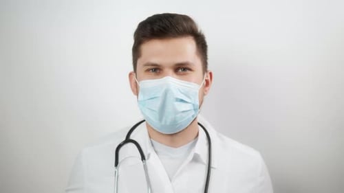 Close Up of Medical Doctor in Mask and Coat