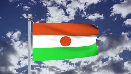 Niger Flag Waving Against a Cloudy Blue Sky