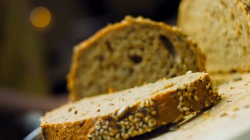 Artisan Bread Slices on Wooden Board