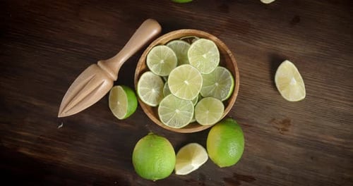 Cut Into Round Slices of Lime on the Plate Slowly Rotates