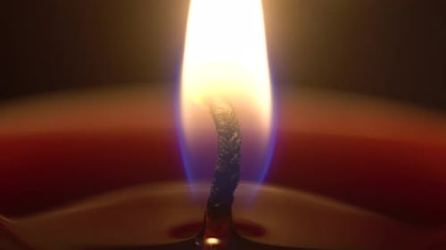 Candle Burning with a Warm Glow, Close-up