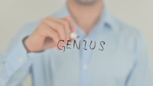 Adult Hand Writes Genius Using a Marker