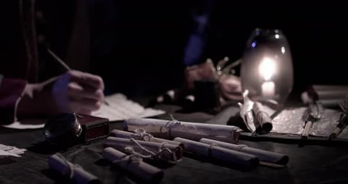 Quill Writer Working by Candlelight in Historical Setting