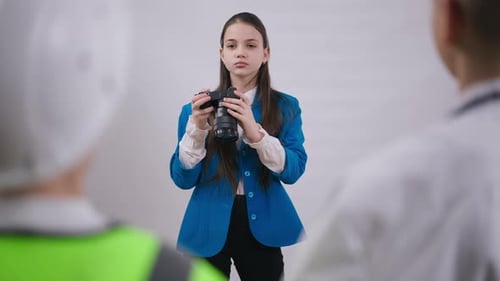 Thoughtful Concentrated Talented Teenage Girl Taking Photo with Camera