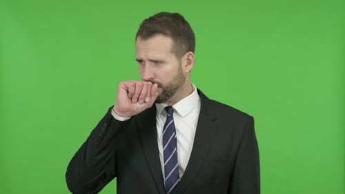Sick Young Businessman Having Coughing Against Chroma Key