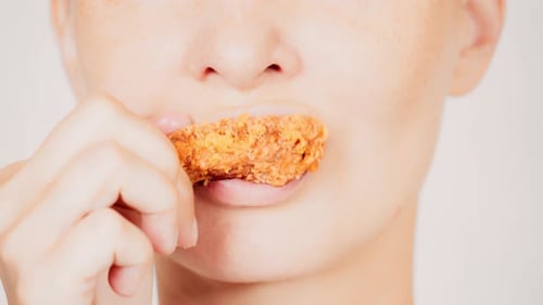Woman Eats Fried Food Close Up