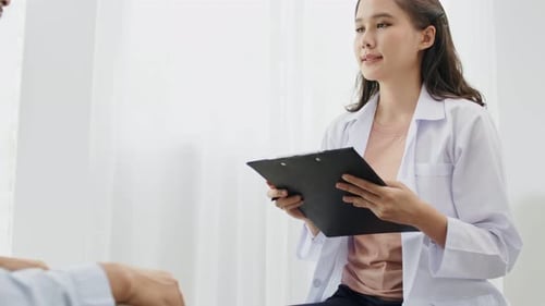 Compassionate Therapist Supporting Patient in Office Setting