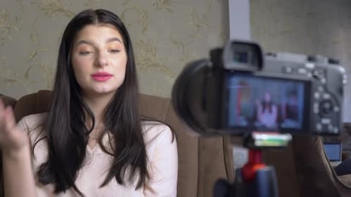 Young Woman Speaking to Camera in a Home Setting
