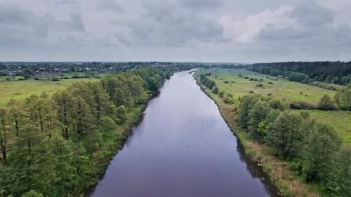 Drone Shot of Landscape with River and Field