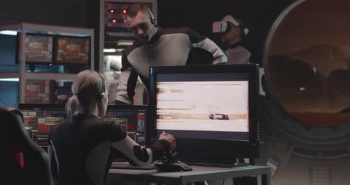 Futuristic Center Controlling a Rover on a Planet
