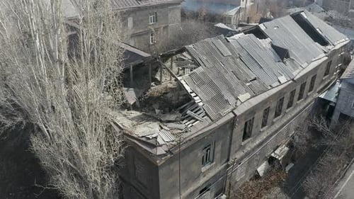 Aerial view abandoned, destroyed building, roof.