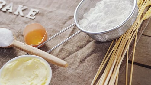 Close Up of Baking Ingredients on Wooden Table